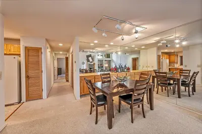 a kitchen and dining room with a table and chairs at 5 McCloud - Bright and Quaint Living in Incline Village
