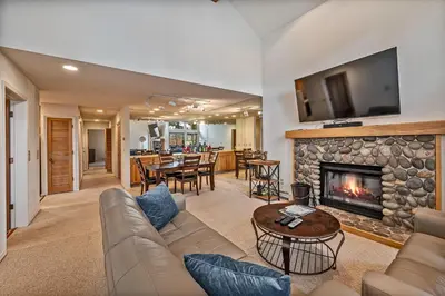 a living room with a couch and a fireplace at 5 McCloud - Bright and Quaint Living in Incline Village