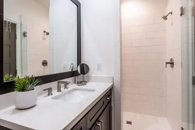 a bathroom with a sink and a mirror at Creekhouse 1380 in Mammoth Lakes