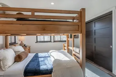 a bedroom with a bunk bed and a bunk bed at Creekhouse 1380 in Mammoth Lakes