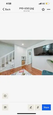 an image of a living room with a staircase at Del Mar pool Home in Fresno
