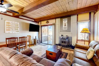 a living room with a couch and a table at Kelly's Kastle in Incline Village