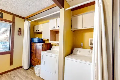 a small laundry room with a washer and dryer at Kelly's Kastle in Incline Village