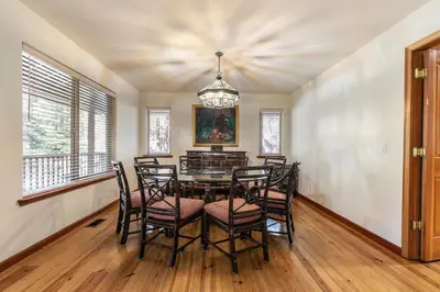 a dining room with a table and chairs at Silver Rock Lodge in Zephyr Cove