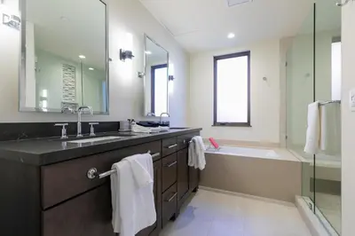 a bathroom with a sink and a bath tub and a sink at Crystal Bay Penthouse 301 in Crystal Bay