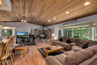 a living room with a couch and a table at Panhandle House in South Lake Tahoe