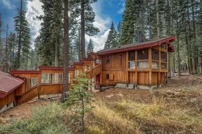 a large wooden house in the woods at Sherwood Chalet - Quiet 3 BR in Ward Canyon, Private Hot Tub, Near Sherwood Chairlift in Tahoe City