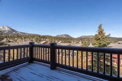 a balcony with a view of the mountains at Snowcreek V 972 in Mammoth Lakes