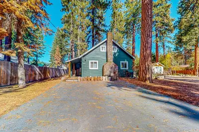 a small green house in the middle of a road at Pine Needle Nook in Kings Beach