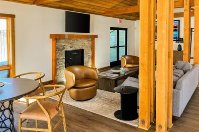 a living room with a couch and a fireplace at Creekhouse 1362 in Mammoth Lakes