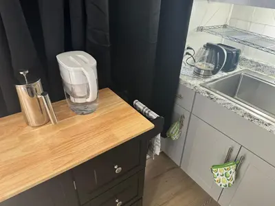 a kitchen counter with a blender on top of it at Midtown Charm: 1BR Urban Pad in Reno