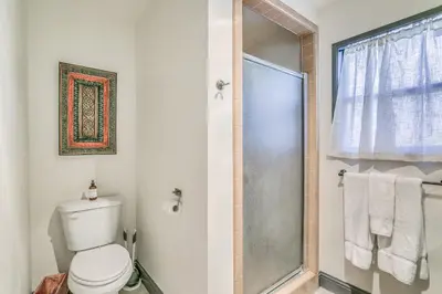 a bathroom with a toilet and a glass shower at Cozy Studio with Well-Being Retreat Near Yosemite! in Ahwahnee