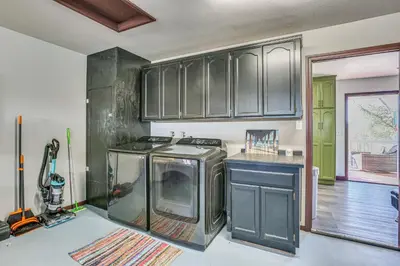 a kitchen with a stove and cabinets in it at Mountain Home Near Yosemite with Well-Being Retreat! in Ahwahnee
