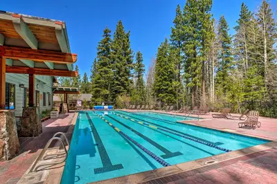 a swimming pool in the backyard of a house at Less Than 1 Mi to North Star Resort Condo with Balcony in Truckee