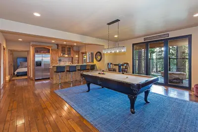 a large living room with a pool table in it at Luxury 4 bedroom 4 5 bath luxury home that sleeps 10 in Incline Village