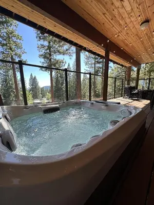 a jacuzzi tub in a house with a view at Luxury 4 bedroom 4 5 bath luxury home that sleeps 10 in Incline Village