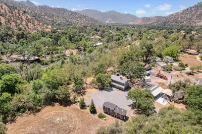 an aerial view of a house in the mountains at Tiny River House in Three Rivers