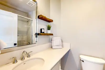 a bathroom with a sink and a toilet at Twilight's Rest in Zephyr Cove