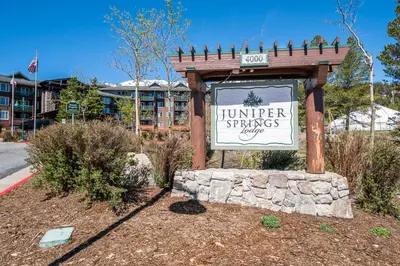 a sign for a jumeirah springs resort at Juniper Springs Lodge #412 - Luxury Ski in Ski out! 2 Bedroom in Mammoth Lakes