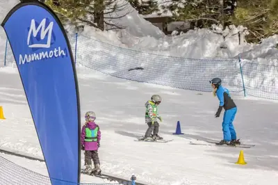 a group of three people on skis in the snow at Horizons 4 138 in Mammoth Lakes