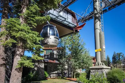 a building with a bell hanging from a crane at Horizons 4 158 in Mammoth Lakes