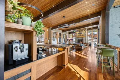 a kitchen with a counter with a stove at Stellar Ski-in Ski-out Out # 2 at Northstar 2 by Tahoe Getaways - Pet-Friendly 3BR Townhome w Loft, Shuttle and HOA! in Truckee-Tahoe Airport