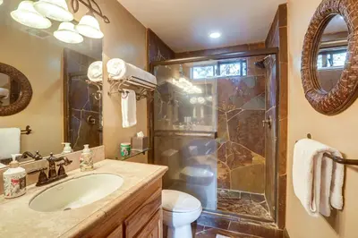 a bathroom with a shower and a sink at Less Than 1 Mi to Lake Tahoe Beaches Home with Fire Pit! in Tahoe City