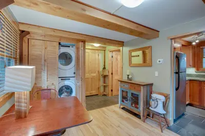 a kitchen with a washer and dryer in a house at Less Than 1 Mi to Beach Peaceful Studio with Deck in Tahoma in Tahoma