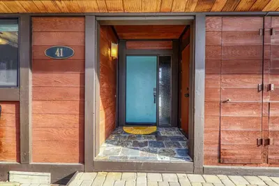 an entrance to a building with a blue door at 4BD Lakeside Retreat with Views in Tahoe City