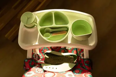 a toy chair with dishes and a clock on it at Reno's Biggest Little House - Cozy Home Theatre in Reno