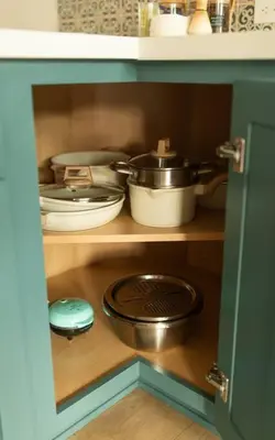 a cabinet filled with lots of pots and pans at Reno's Biggest Little House - Cozy Home Theatre in Reno