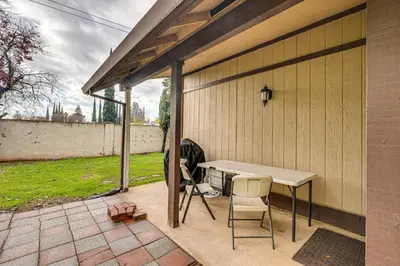 a patio with a table and two chairs on it at Cozy Antelope Home about 14 Mi to Sacramento! in Antelope