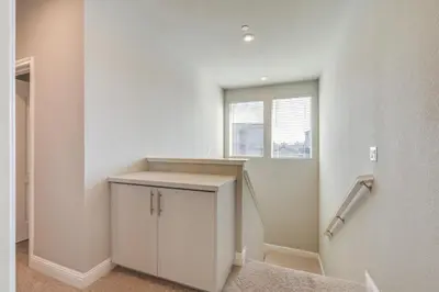 a white room with a counter and a window at Stylish Lodi Wine Country Retreat with Private Patio in Lodi