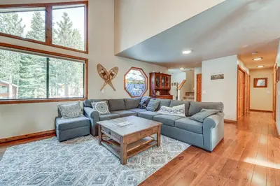 a living room with a couch and two chairs and a table at Family Cabin with Community Perks in Truckee! in Truckee