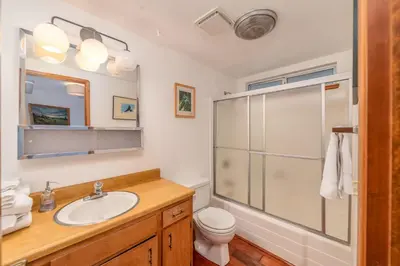 a bathroom with a sink and a shower at Ravenhill in Arnold