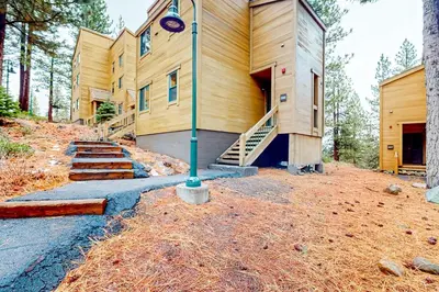 a house with a staircase on the side of it at Northstar Nirvana in Truckee