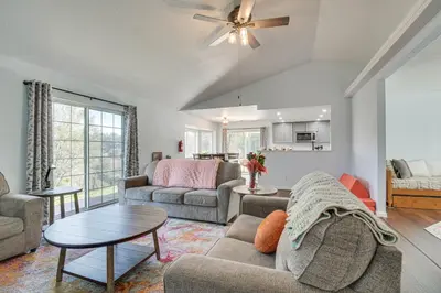 a living room with a couch and a table at Bright and Cozy Mariposa Getaway 46 Mi to Yosemite! in Mariposa