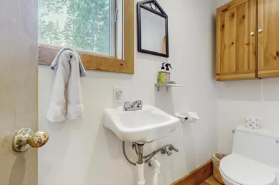 a bathroom with a sink and a toilet at The Mountain House in Soda Springs