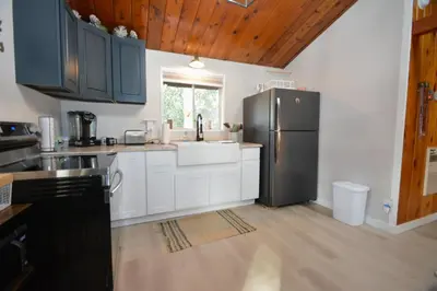 a kitchen with a refrigerator and a sink at Bear Paw- Lake Area Winter Special Ends 51526 in Bass Lake