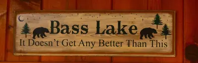 a sign that says bass lake if doesnt get any better than this at Bear Paw- Lake Area Winter Special Ends 51526 in Bass Lake
