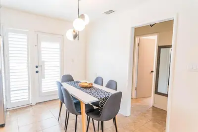 a dining room with a table and chairs at Arden Family Home BBQ Big Kitchen Backyard Pet W/D in Sacramento