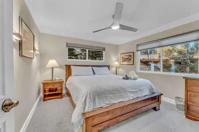 a bedroom with a bed and a window at Big Blue Views Walk 2 Lake in Tahoe Vista