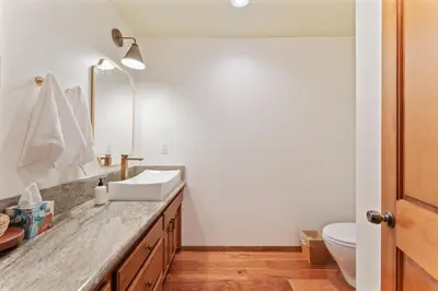 a bathroom with a sink and a toilet at The Pinecrest Retreat- 10 mins to NorthStar! Hot Tub, Large Deck, Views, and Games in Tahoe Vista