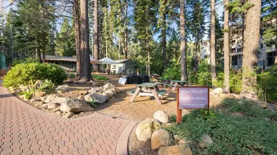 a park with a picnic table and a sign at In Northstar Ski Resort Game Room Family-Friendly Dakine Haus by AvantStay in Truckee