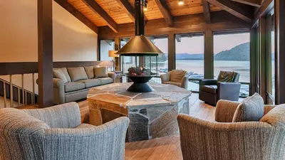 a large living room with a table and chairs at Cozy Deluxe Studio #131 at Donner Lake Village in Truckee