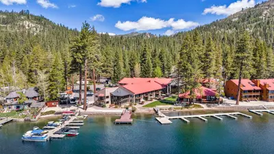 an aerial view of a resort on a lake at Cozy Deluxe Studio #131 at Donner Lake Village in Truckee