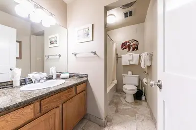 a bathroom with a sink and a toilet at Quaint Studio w/Lake View #146 at Donner Lake Village in Truckee