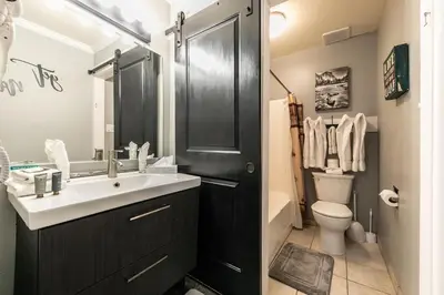 a bathroom with a sink and a shower and a toilet at King Deluxe Studio 2nd Floor Unit 216 Bldg B in Truckee