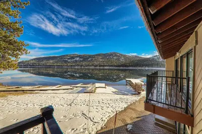 a balcony of a house with a view of a lake at Charming Deluxe Studio w/Lake View #246 at Donner Lake Village in Truckee