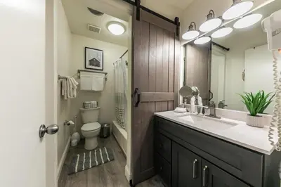 a bathroom with a sink and a toilet at Beautiful Deluxe Studio w/Lake View #245 at Donner Lake Village in Truckee